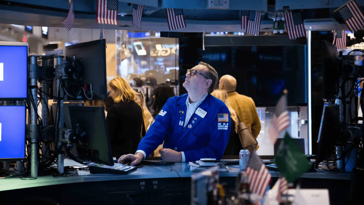 U.S. stocks hit intraday and closing records as tech shares lead gains, while oil falls on higher-for-longer rate concerns