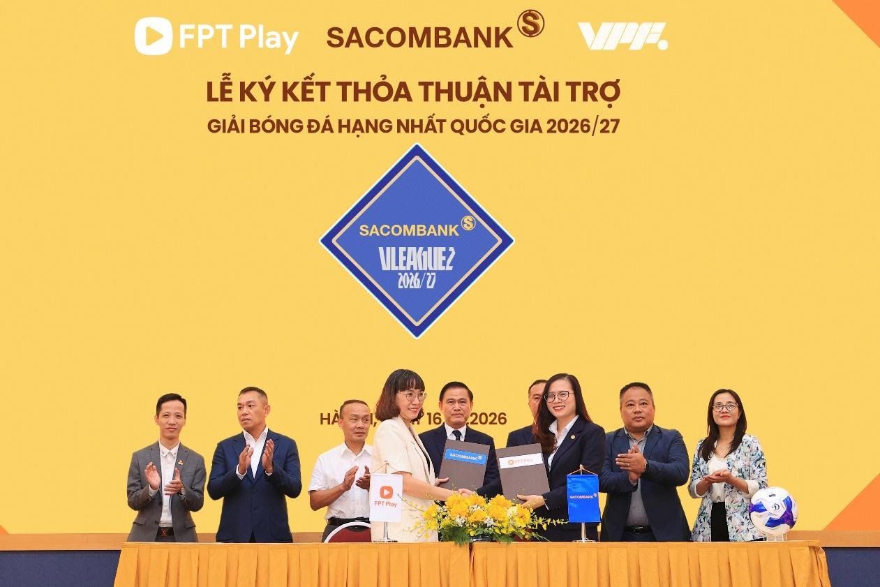 dai-dien-sacombank-va-dai-dien-cong-ty-co-phan-vien-thong-fpt-thuc-hien-nghi-thuc-ky-ket.jpg