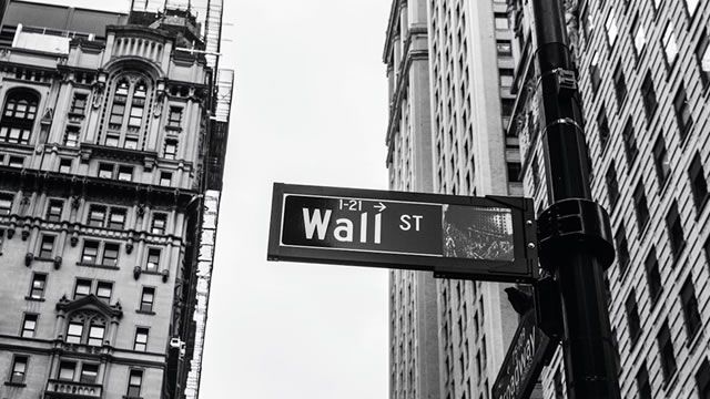 Fed holds rates steady at Warsh's first meeting, trims rate-cut expectations for 2026