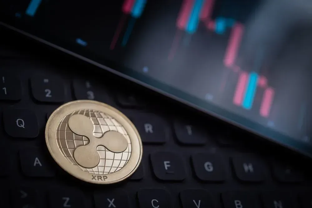 XRP Breaks Bull Flag; Liquidity Tightens and Institutional Inflows Drive $1.60 Target Outlook